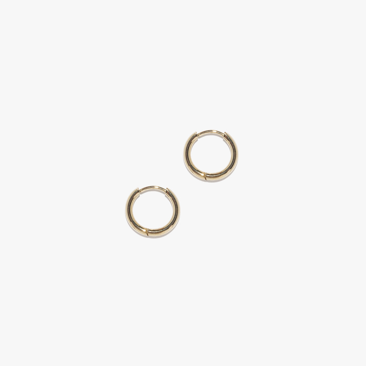 infinity hoop earrings { gold + silver }